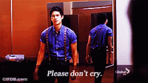 Man In Blue Shirt And Suspenders Saying Please Don't Cry GIF