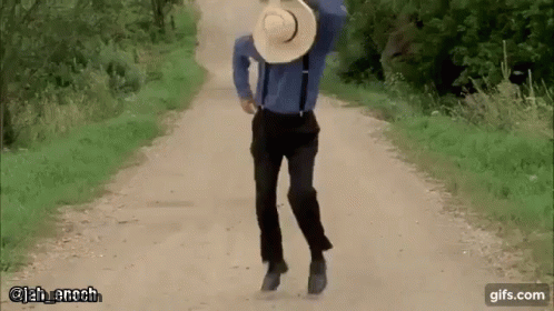 Man In Blue Shirt And Suspenders Walking GIF
