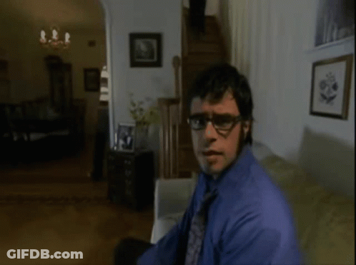 Man In Blue Shirt And Tie Sings It's Business GIF