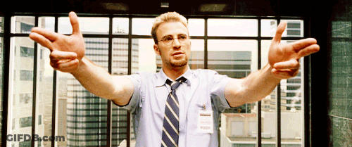 Man In Blue Shirt And Tie With Chris Evans Name Tag GIF