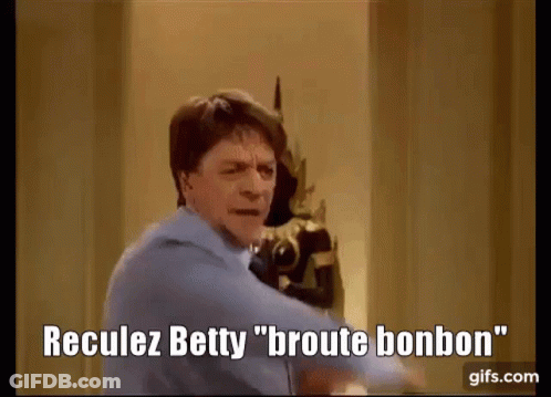 Man In Blue Shirt And Tie With Reculez Betty GIF