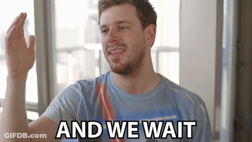 Man In Blue Shirt And We Wait On It GIF