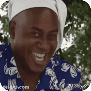 Man In Blue Shirt And White Bandana Smiling GIF