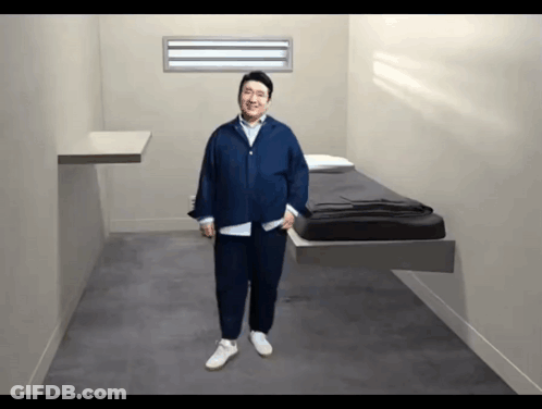 Man In Blue Shirt And White Shoes GIF
