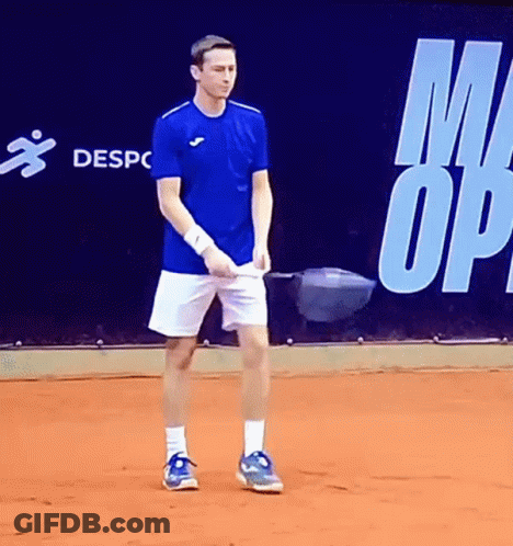Man In Blue Shirt And White Shorts On Court GIF