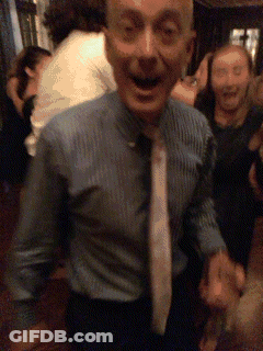 Man In Blue Shirt And White Tie Dancing GIF