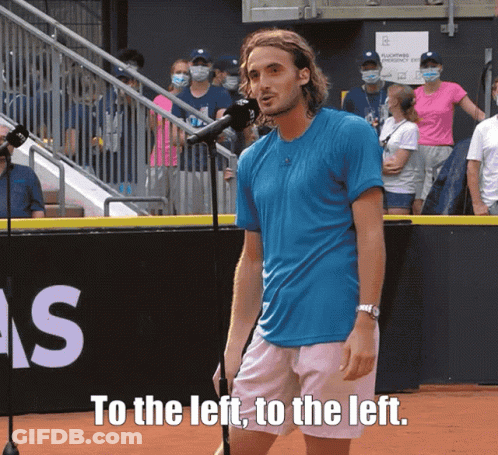 Man In Blue Shirt At Microphone To The Left To The Left GIF