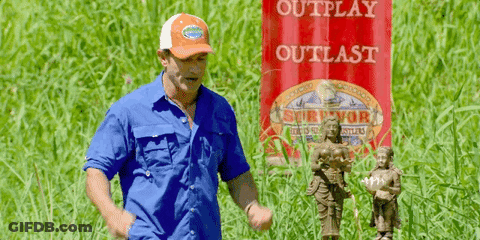 Man In Blue Shirt At Red Outplay Outlast Sign GIF
