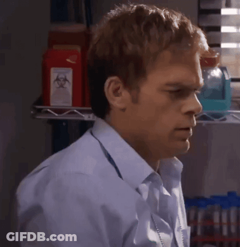 Man In Blue Shirt By Biohazard Sign GIF