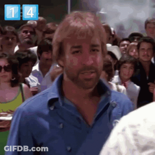 Man In Blue Shirt Crowd 14 GIF