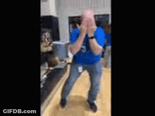 Man In Blue Shirt Dancing And Clapping GIF