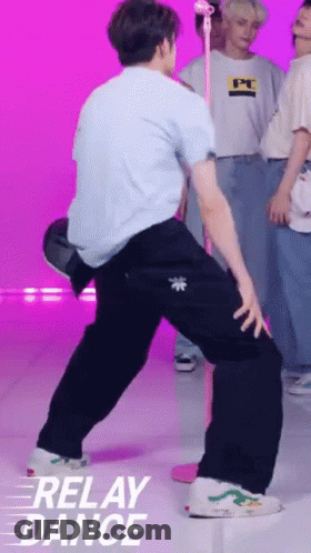 Man In Blue Shirt Dancing In Front Of Crowd GIF