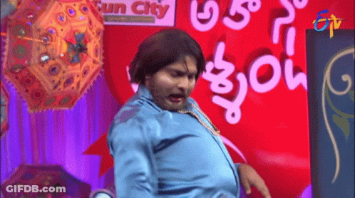 Man In Blue Shirt Dancing In Sun City GIF
