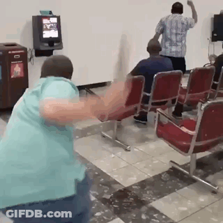 Man In Blue Shirt Dancing In Waiting Room GIF
