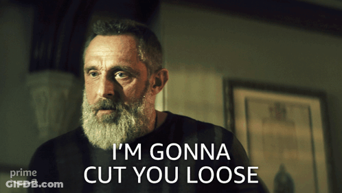 Man In Blue Shirt Dancing On Wooden Floor GIF