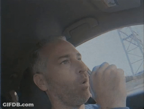 Man In Blue Shirt Driving Car Eyes Closed GIF