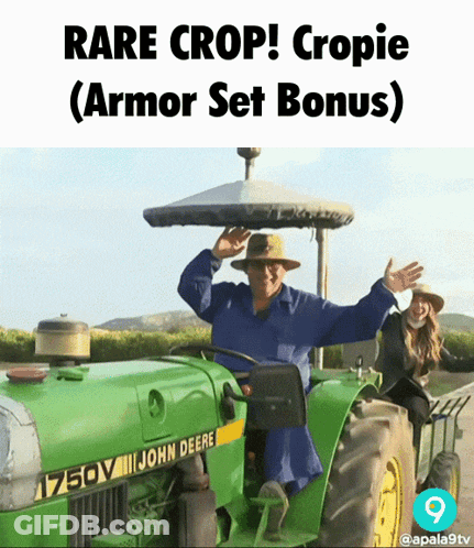 Man In Blue Shirt Driving John Deere Tractor GIF