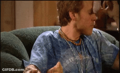 Man In Blue Shirt Eating Chips GIF