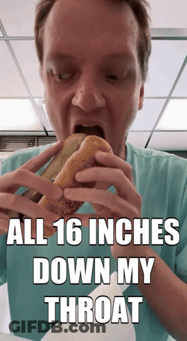 Man In Blue Shirt Eating Donut Saying All 16 Inches Down My Throat GIF