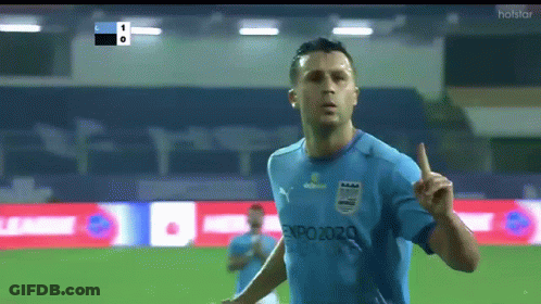 Man In Blue Shirt Expo2020 Pointing Up GIF