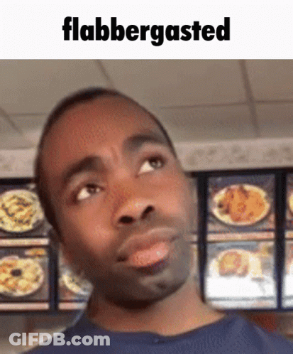 Man In Blue Shirt Flabbergasted GIF