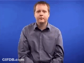 Man In Blue Shirt Gesturing GIF