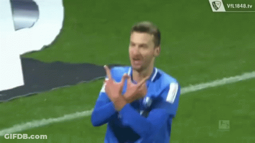 Man In Blue Shirt Giving Middle Finger GIF