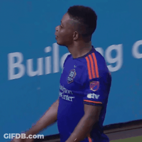 Man In Blue Shirt Giving Middle Finger GIF