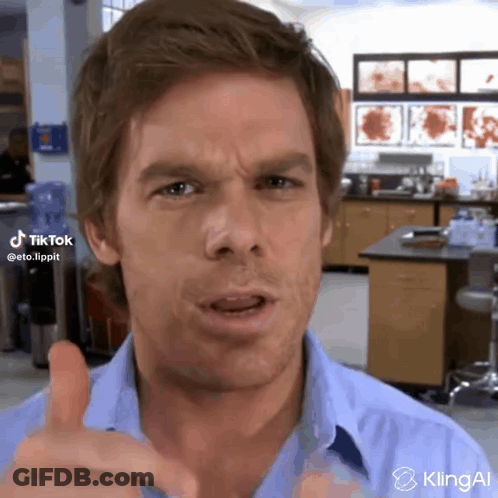 Man In Blue Shirt Giving Thumbs Up GIF