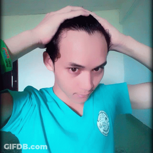Man In Blue Shirt Hands On Head I Love You Wristband GIF