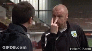 Man In Blue Shirt Holding Banana GIF