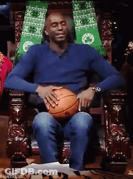 Man In Blue Shirt Holding Basketball GIF