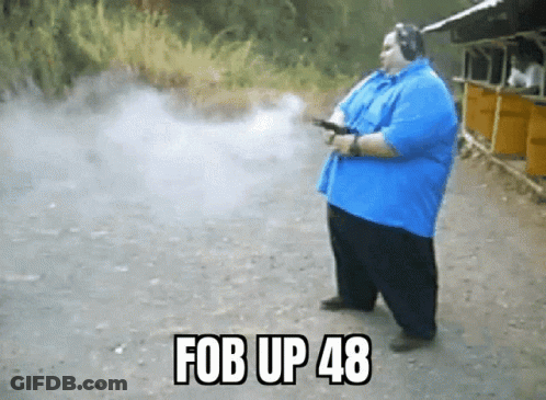 Man In Blue Shirt Holding Gun With Fob Up 48 GIF
