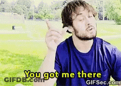 Man In Blue Shirt Holding Ice Cream Saying You Got Me There GIF