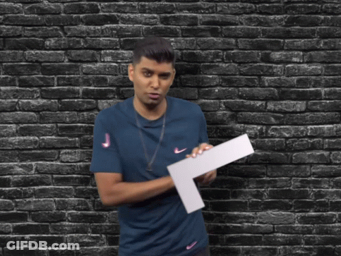 Man In Blue Shirt Holding Large L GIF