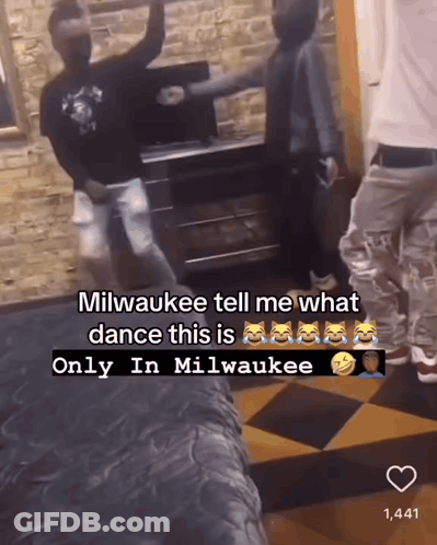 Man In Blue Shirt Holding Old Milwaukee Beer GIF