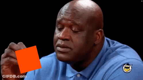 Man In Blue Shirt Holding Orange Card GIF