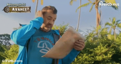 Man In Blue Shirt Holding Paper Saying Avance GIF