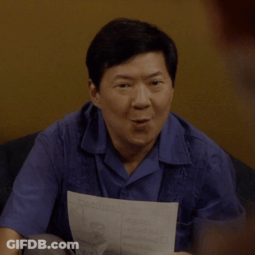 Man In Blue Shirt Holding Paper Saying Triumph GIF