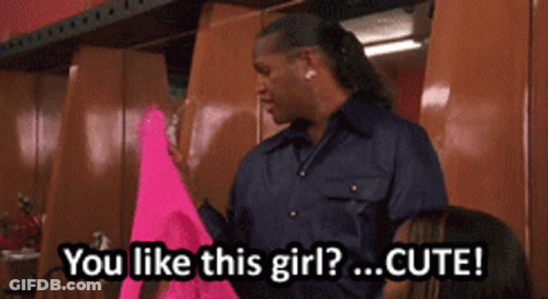 Man In Blue Shirt Holding Pink Shirt Saying You Like This Girl GIF