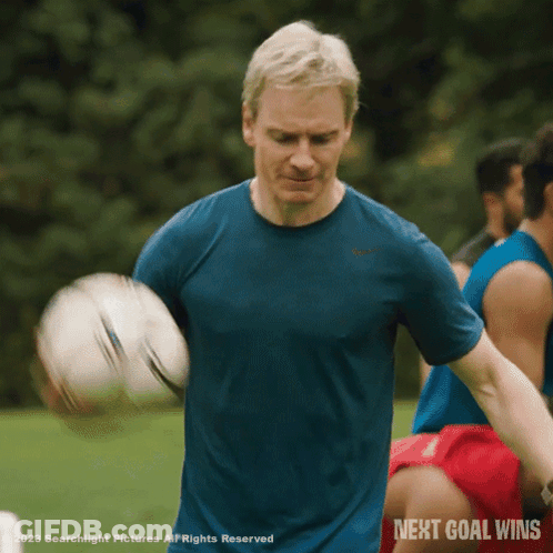 Man In Blue Shirt Holding Soccer Ball Next Goal Wins GIF