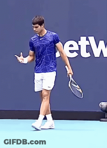 Man In Blue Shirt Holding Tennis Racket Saying Etw GIF