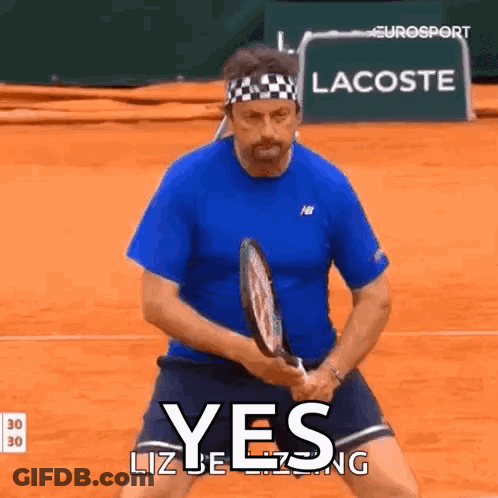 Man In Blue Shirt Holding Tennis Racquet Saying Yes GIF