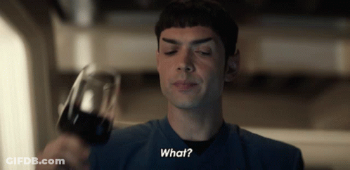 Man In Blue Shirt Holding Wine And Saying What GIF