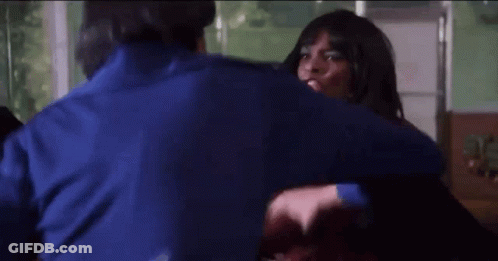 Man In Blue Shirt Holding Woman In Blue Shirt GIF