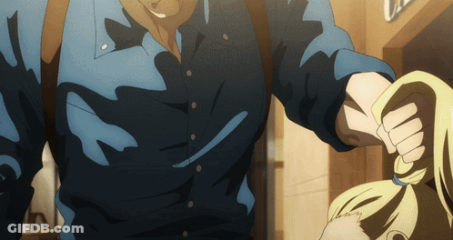 Man In Blue Shirt Holding Woman's Hair GIF