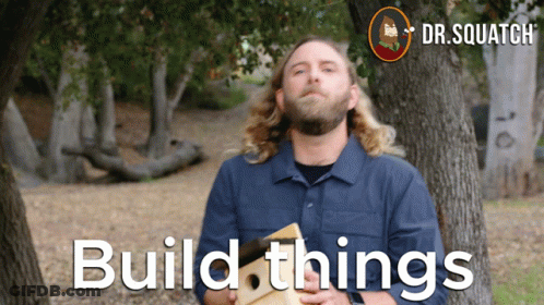 Man In Blue Shirt Holding Wood Build Things GIF