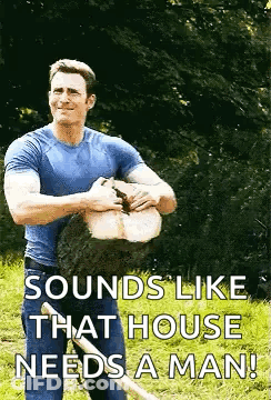 Man In Blue Shirt Holding Wood Saying Sounds Like That House Needs A Man GIF