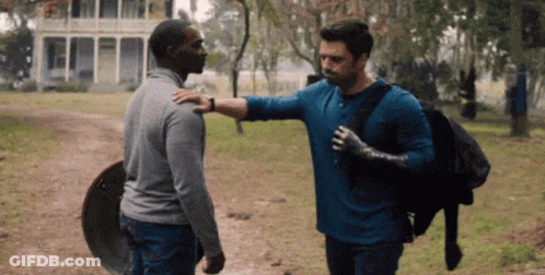Man In Blue Shirt Hugging Another Man GIF