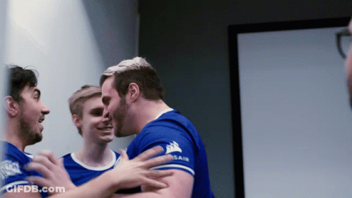 Man In Blue Shirt Hugging Another GIF
